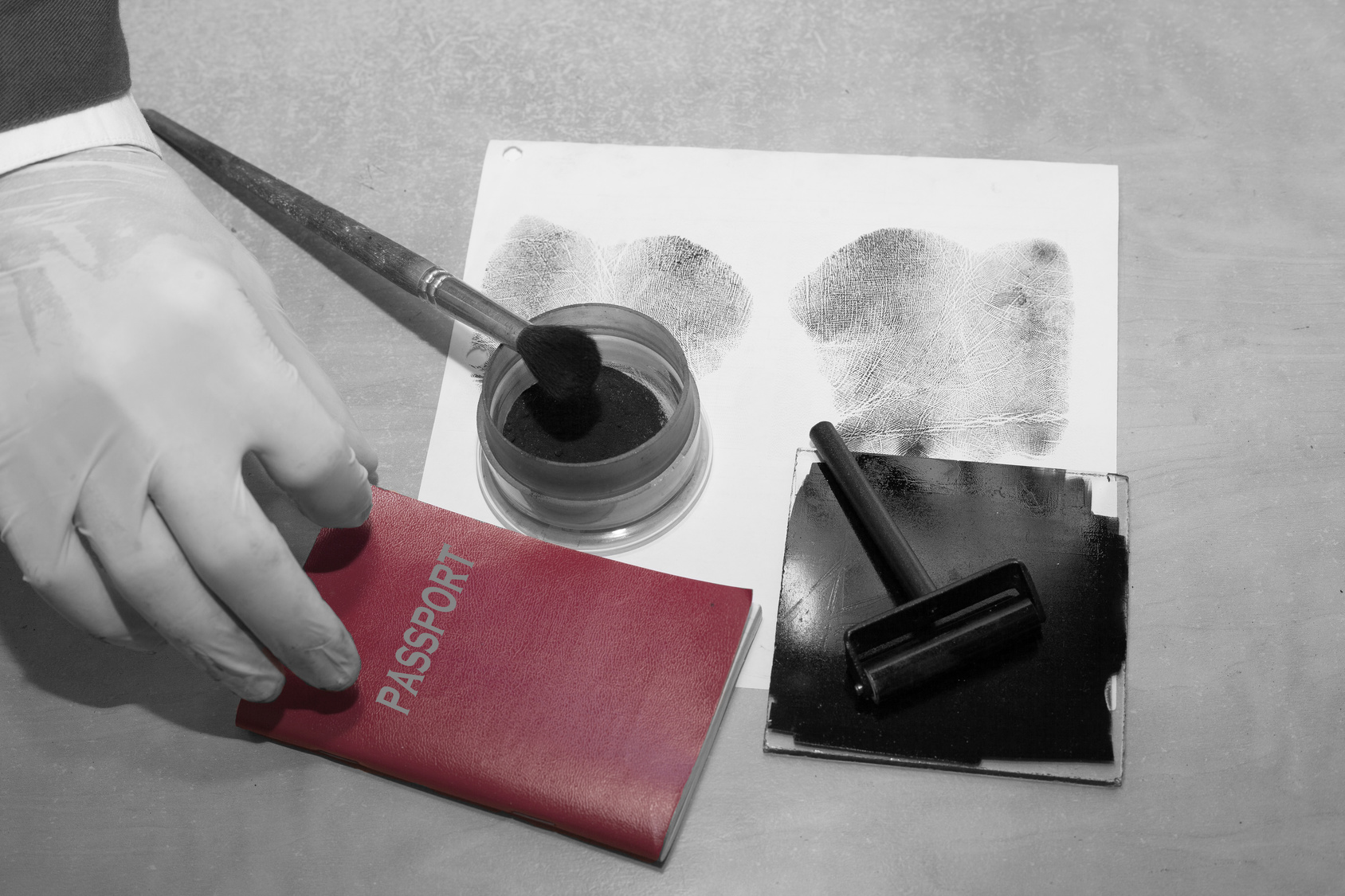 Expert examines the document at the scene